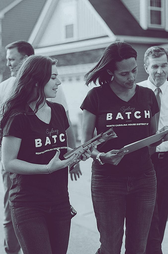 The Democratic Legislative Campaign Committee is the sole organization dedicated to electing Democrats to statehouses. Legislator Sydney Batch alongside a volunteer holding a clipboard during a canvass.