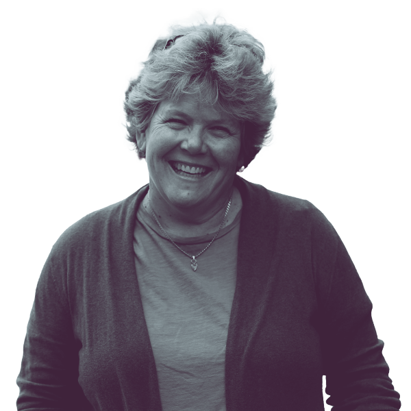 A black and white image of Ann Johnson Stewart of Minnesota Senate district forty-five from the waist up, smiling and looking into the camera.