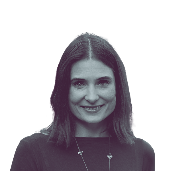 A black and white portrait of Victoria Hunt, Democratic candidate for Washington Senate District 5, smiling and looking into the camera.