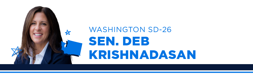 A portrait of Sen. Deb Krishnadasan, Democratic candidate for Washington Senate District 26, smiling and looking into the camera. Next to the candidate is blue text showing their name, state, and district.